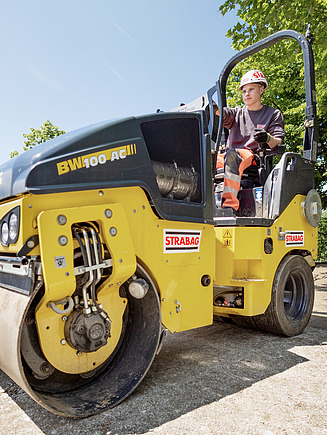 Trainee driving a roller.