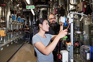 One woman and one man work in the service engineering department at STRABAG