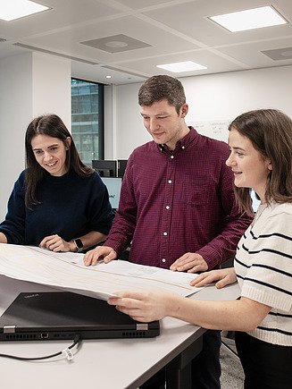 Three colleagues around a table